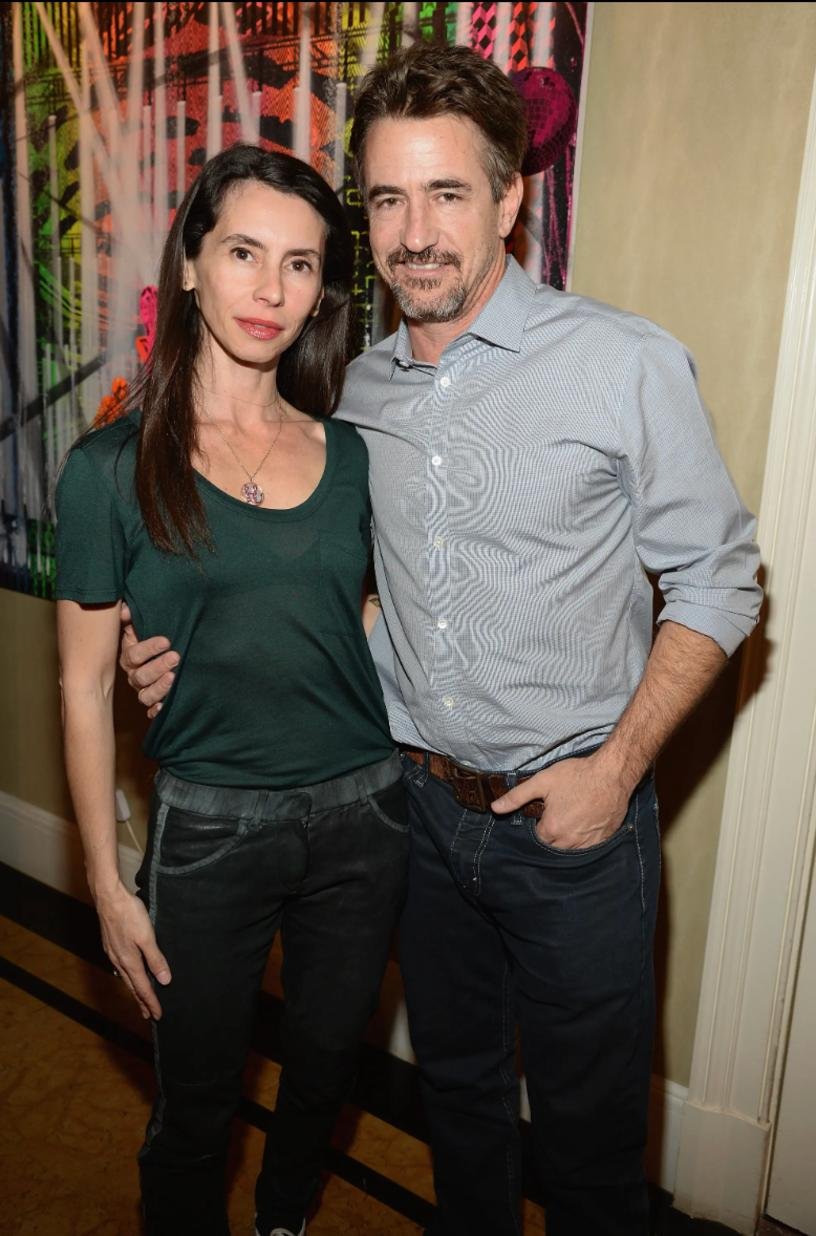 Dermot Mulroney has filed for divorce from his wife, Prima Apollinaare, after 14 years of marriage.
Kevin Mazur
Dermot Mulroney and his estranged wife, Prima Apollinaare, posing for a picture at a Variety red carpet event.
